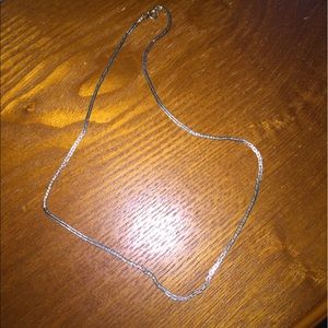 Silver chain necklace.